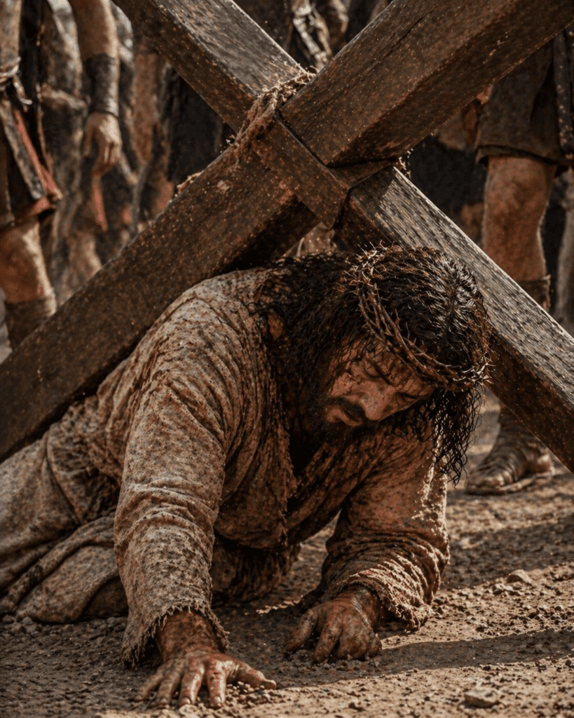 Fourth Sorrowful Mystery of the Rosary. Jesus falls beneath the weight of the cross for the second time as He continues His journey to Calvary.